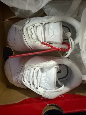 Puma Kids White Sneakers with Red Tag Accent